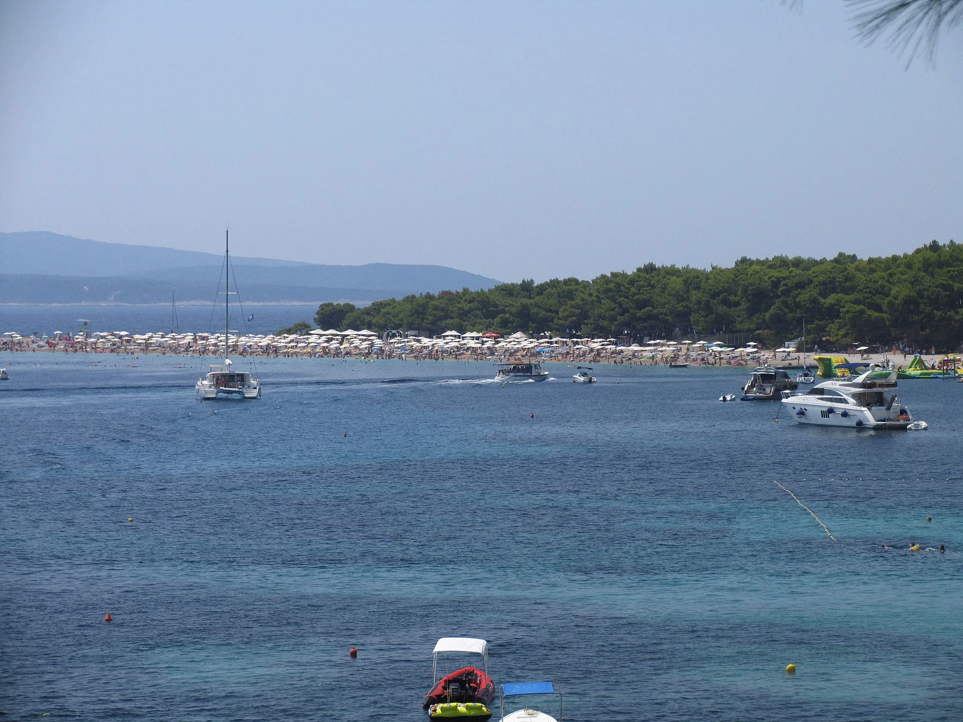 A pebble beach and turquoise water on the Dalmatian coast, Croatia