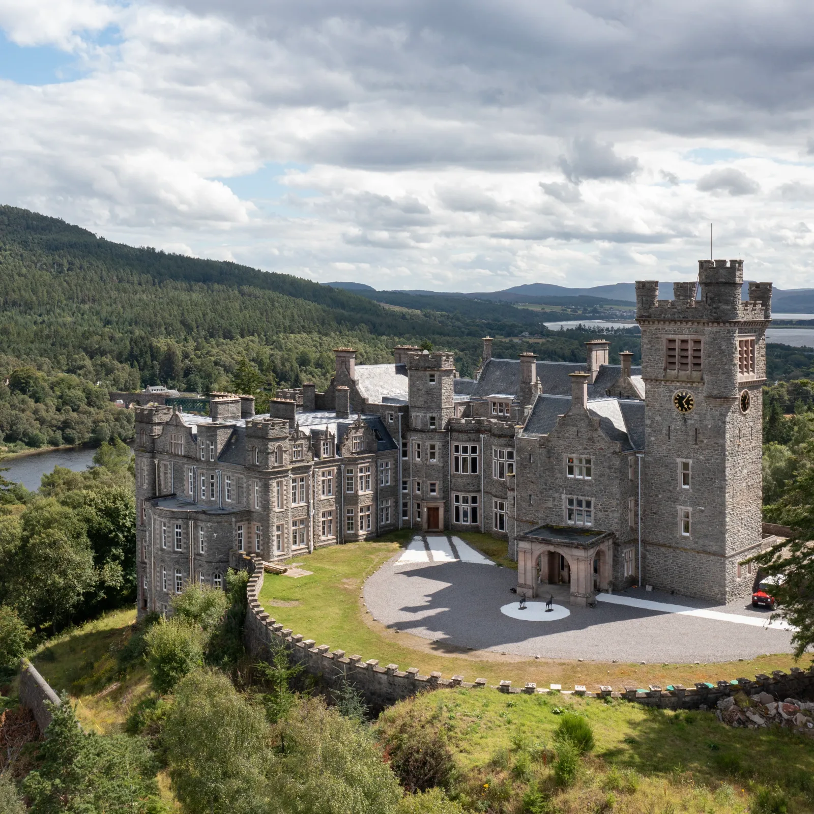 Stone Scottish castle or manor estate with grounds