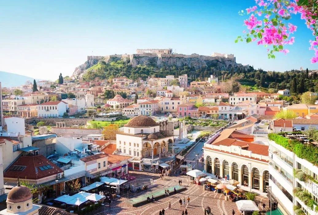 Sunny view over Monastiraki Square in Athens with the Acropolis and Parthenon rising on the hill behind