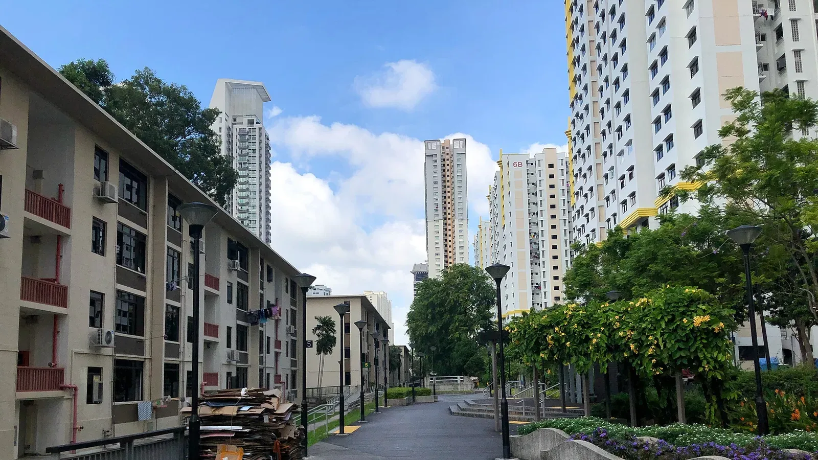 Leafy low-rise walk-up apartments along a canal footpath in Tiong Bahru, Singapore's trendy district for young professionals
